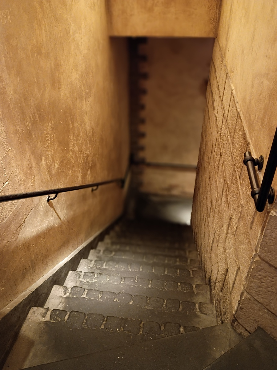 Figure 28: Stairs down to the jazz basement level at Cafe Cotton Club (November 2025)