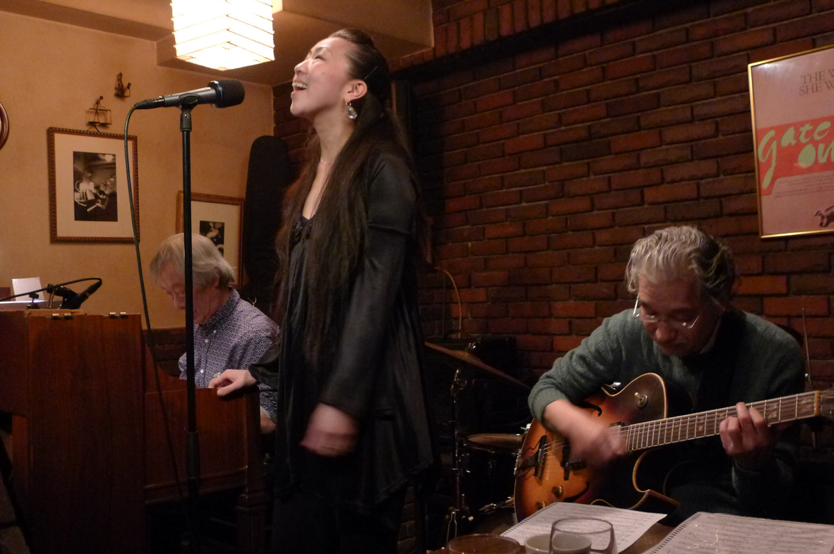 Figure 6: Yuka Ueda (vocals) with Junichiro Ohkuchi (piano) and Shinji Hashimoto (guitar) at Gate One in 2012