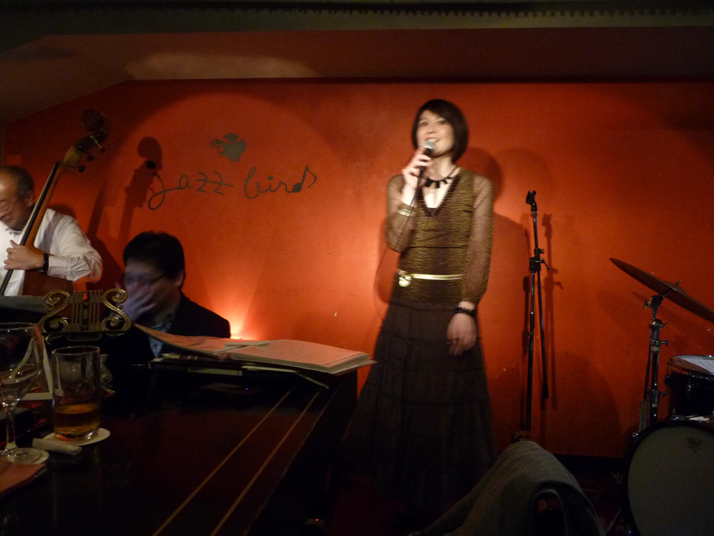 Figure 1: Vocalist Mie Joké singing at Jazz Bird in 2011