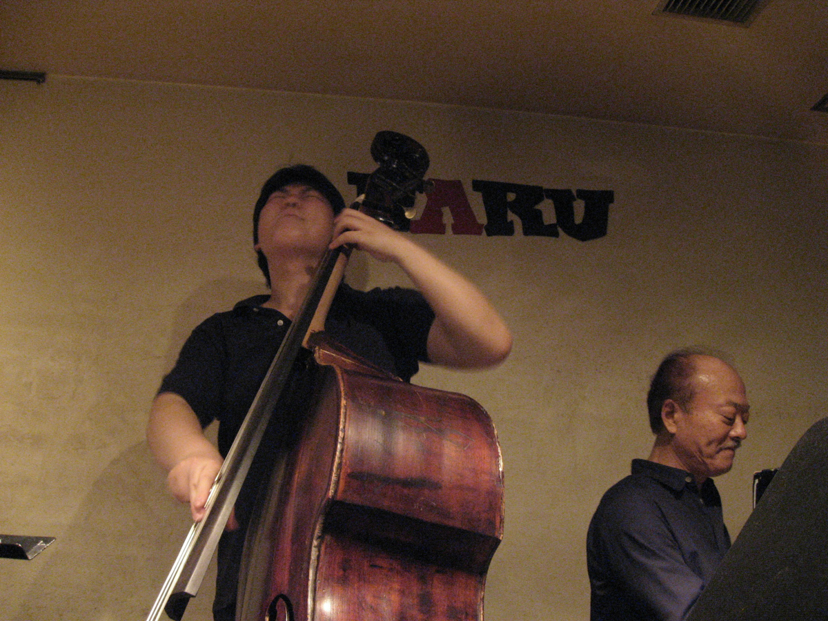 Figure 1: Fumio Karashima (piano) and Ryu Kawamura (bass) at Naru in May 2007 # shows NARU sign