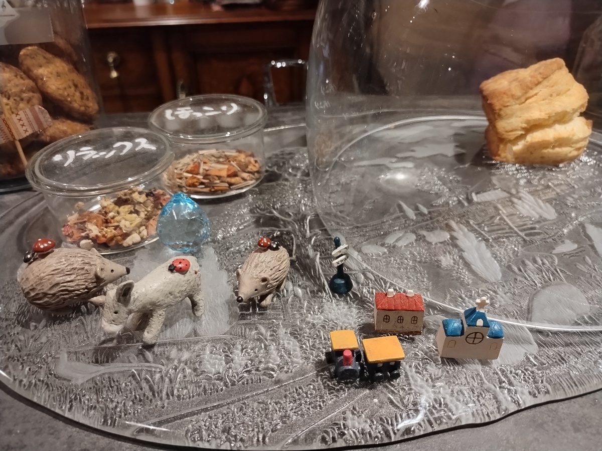 Figure 9: Pastoral scene and pastries at On A Slow Boat To&mldr;