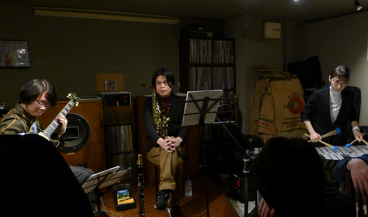 Figure 4: Ryosuke Kano (saxophone), Horie Hiroyoshi (guitar), and Reiko Yamamoto (vibraphone) at On A Slow Boat To&mldr; in March 2025