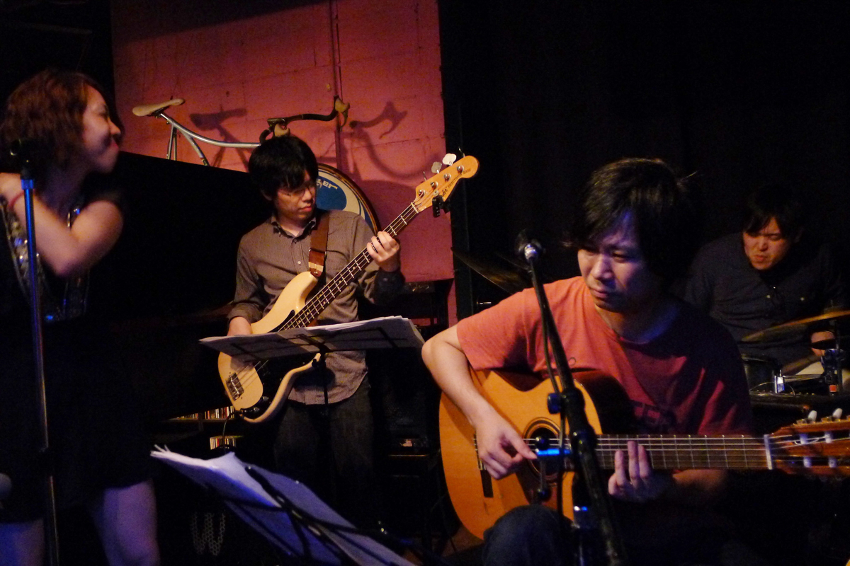Figure 33: Sanae Ishikawa (vocals), Daisuke Toi (bass), Takayoshi Baba (guitar), and Yuto Maseki (drums) at Salt Peanuts in 2013