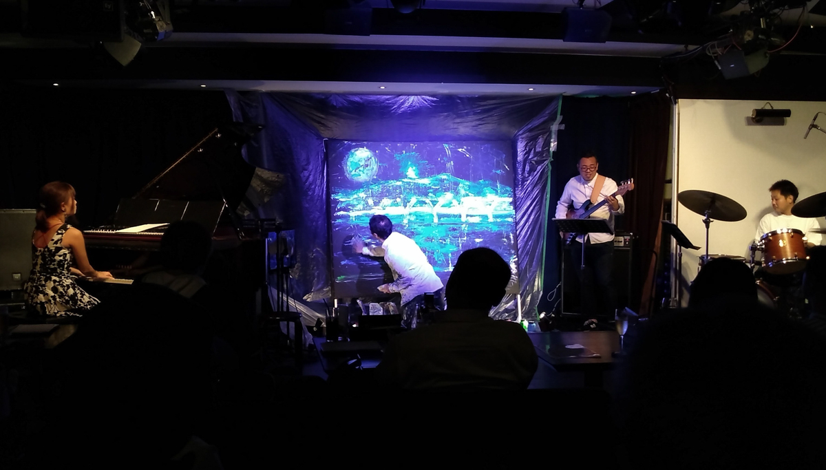 Figure 2: The Sayaka Kishi Trio with live painting in 2019