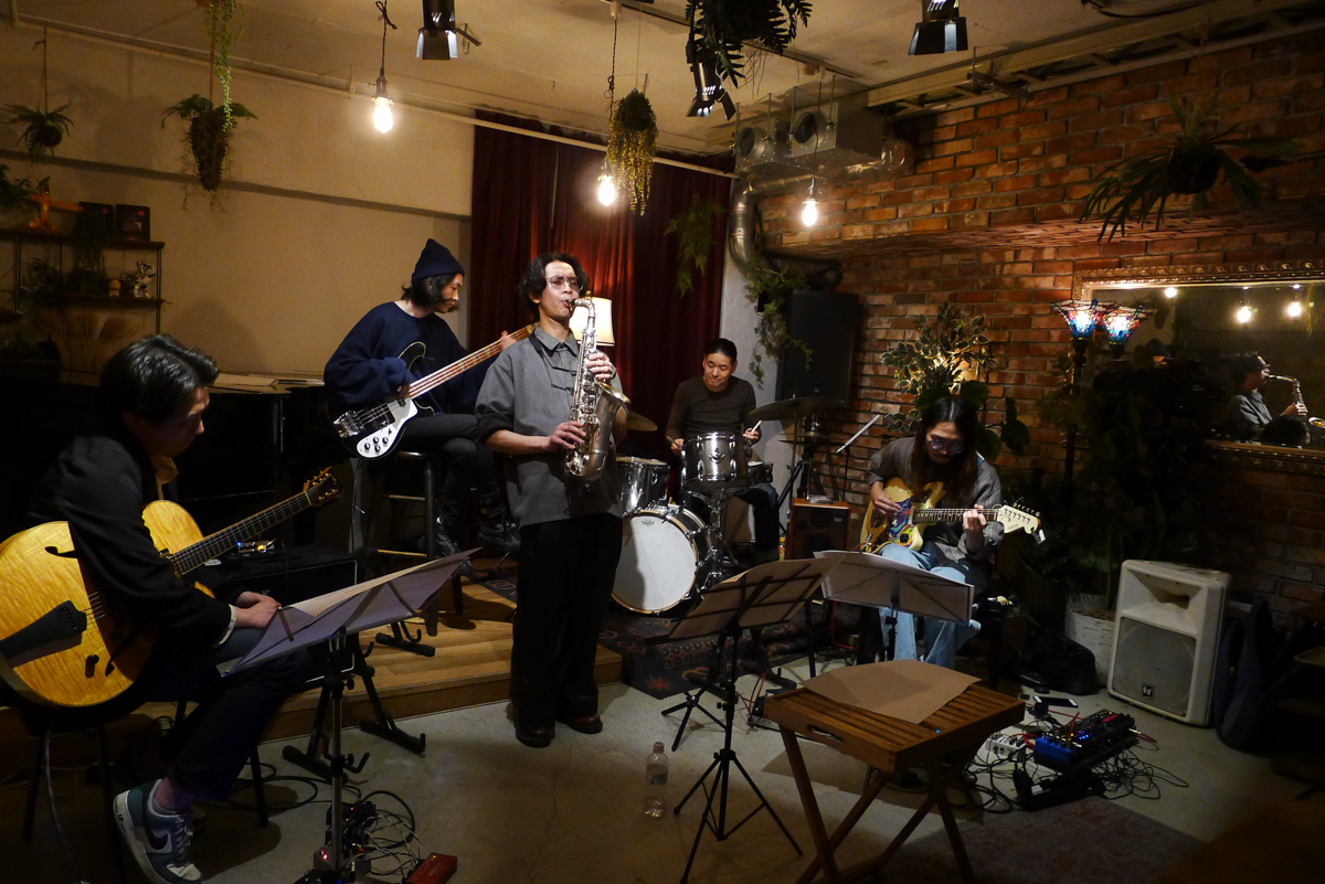Figure 5: 2G1B1D1H group with Shinji Miyazaki (guitar), Junja Kameyama (guitar), Masatake Abe (bass), Kazumi Ikenaga (drums), and Masaki Hanawa (sax) at Velvet Sun in 2025